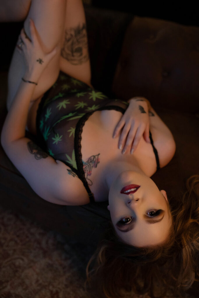 Jara in green leaf-patterned lingerie, embracing the Halloween boudoir vibes in Tulia, Texas.
